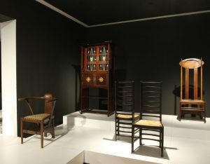Works by Charles Rennie Mackintosh, save the chair on the left, that is by an artist unknown, as seen at From Arts and Crafts to the Bauhaus. Art and Design - A New Unity, The Bröhan Museum Berlin