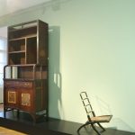 A cupboard and folding chair by Edward William Godwin, as seen at From Arts and Crafts to the Bauhaus. Art and Design - A New Unity, The Bröhan Museum Berlin